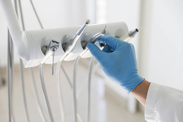 Professional Tooth Extraction technician working in Bartlett, TX